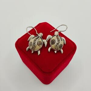 Zealandia Hand Crafted Sea Turtle in Fossilized Walrus Ivory and Sterling Silver